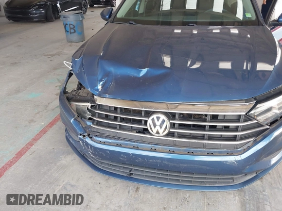 2019 Volkswagen Jetta S z VIN 3VWC57BU4KM005853, wystawiony jako IAAI lot #42183004 z przebiegiem 104 691 mil mil oraz . Historia ofert i sprzedaży dostępna na DreamBid. Obrazek 6.