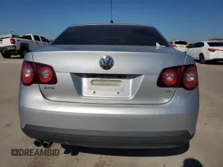 2009 Volkswagen Jetta S z VIN 3VWJM71K79M167562, wystawiony jako Copart lot #80546594 z przebiegiem 196 891 mil mil oraz Szkoda całkowita • Salvage title. Historia ofert i sprzedaży dostępna na DreamBid. Obrazek 6.