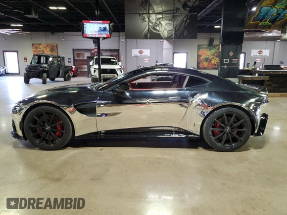 2020 Aston Martin Vantage z VIN SCFSMGAW1LGN03414, wystawiony jako Copart lot #84055064 z przebiegiem 24 509 mil mil oraz Szkody całkowita. Historia ofert i sprzedaży dostępna na DreamBid. Obrazek 3.