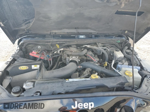 2011 Jeep Wrangler Unlimited Rubicon с VIN 1J4BA6H17BL634200, выставлен на аукционе Copart как лот 56154275 с пробегом 146 500 миль миль и Списание • Salvage title. История ставок и продаж доступна на DreamBid. Изображение 11.