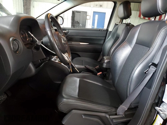 2016 Jeep Compass Latitude with VIN 1C4NJDEB2GD573909, listed as a Copart auction lot 62168225 with 70,944 mi miles and Salvage title. Bid and sale history available at DreamBid. Image 7.