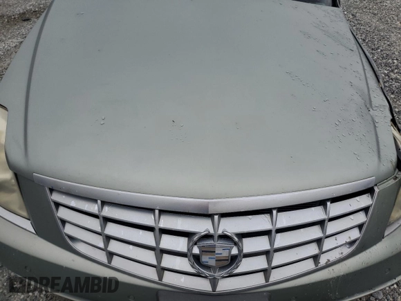 2006 Cadillac DTS 1SD z VIN 1G6KD57YX6U193025, wystawiony jako Copart lot #45784605 z przebiegiem Nie podano mil oraz Szkody całkowita. Historia ofert i sprzedaży dostępna na DreamBid. Obrazek 13.