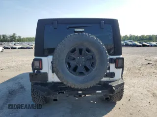 2016 Jeep Wrangler Unlimited Sport with VIN 1C4BJWDG0GL187779, listed as a Copart auction lot 62480015 with 109,296 mi miles and Salvage title. Bid and sale history available at DreamBid. Image 6.