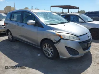 2014 Mazda 5 Sport with VIN JM1CW2BL9E0166281, listed as a IAAI auction lot 42273369 with 120,990 mi miles and . Bid and sale history available at DreamBid. Image 1.