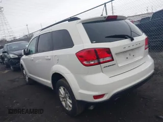 2014 Dodge Journey SXT with VIN 3C4PDCBB8ET153190, listed as a IAAI auction lot 41854655 with 153,048 mi miles and . Bid and sale history available at DreamBid. Image 3.