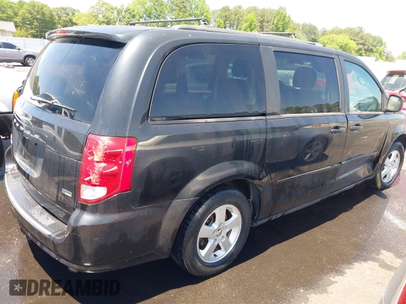 2012 Dodge Grand Caravan SXT with VIN 2C4RDGCG8CR247824, listed as a IAAI auction lot 42210397 with 200,919 mi miles and . Bid and sale history available at DreamBid. Image 4.