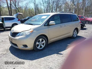 2012 Toyota Sienna LE AAS with VIN 5TDKK3DC9CS184090, listed as a IAAI auction lot 42123891 with 162,065 mi miles. Bid and sale history available at carsss.com. Image 2.