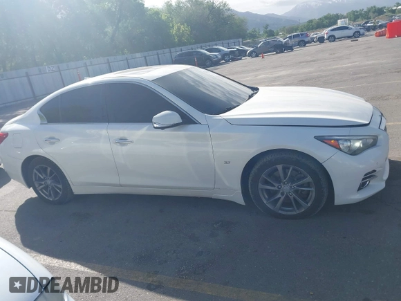 2015 Infiniti Q50 Premium z VIN JN1BV7ARXFM416349, wystawiony jako IAAI lot #42225088 z przebiegiem 194 127 mil mil oraz . Historia ofert i sprzedaży dostępna na DreamBid. Obrazek 13.