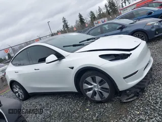 2023 Tesla Model Y Long Range with VIN 7SAYGDEE7PF809164, listed as a IAAI auction lot 41828974 with 31,772 mi miles. Bid and sale history available at carsss.com. Image 13.