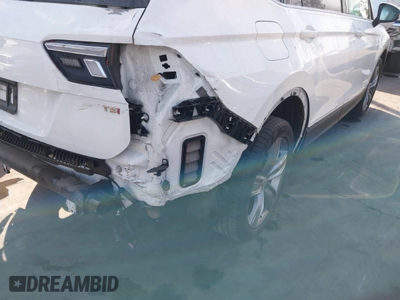2018 Volkswagen Tiguan SEL Premium with VIN 3VV5B7AX5JM176434, listed as a IAAI auction lot 41684514 with 47,988 mi miles and . Bid and sale history available at DreamBid. Image 6.