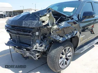 2024 Chevrolet Tahoe LT with VIN 1GNSCNKD7RR374098, listed as a IAAI auction lot 41849542 with 7,227 mi miles and . Bid and sale history available at DreamBid. Image 6.