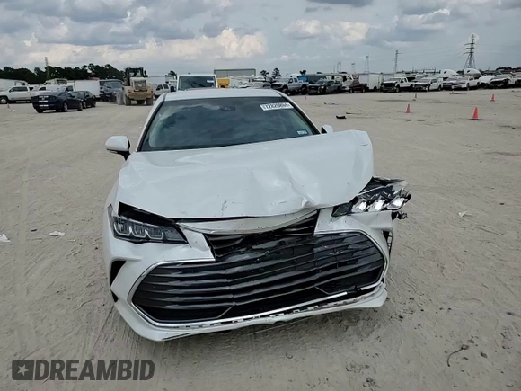 2021 Toyota Avalon Hybrid XLE z VIN 4T1JA1AB6MU007682, wystawiony jako Copart lot #72820894 z przebiegiem 20 585 mil mil oraz Szkoda całkowita • Salvage title. Historia ofert i sprzedaży dostępna na DreamBid. Obrazek 10.