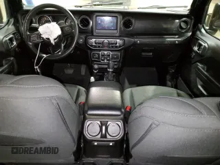 2021 Jeep Wrangler Unlimited Sport Altitude with VIN 1C4HJXDN0MW709609, listed as a Copart auction lot 84148934 with Not provided miles and Salvage title. Bid and sale history available at DreamBid. Image 8.