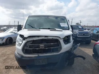2019 Ford Transit Passenger XL with VIN 1FBZX2YM5KKA48112, listed as a IAAI auction lot 41518013 with 163,856 mi miles and . Bid and sale history available at DreamBid. Image 13.