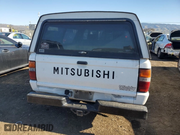 1990 Mitsubishi Mighty Max z VIN JA7FL24W3LP007688, wystawiony jako Copart lot #42651005 z przebiegiem 265 379 mil mil oraz Tytuł czysty. Historia ofert i sprzedaży dostępna na DreamBid. Obrazek 6.