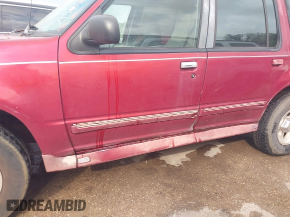 1995 Ford Explorer Eddie Bauer z VIN 1FMDU32X0SUA98813, wystawiony jako IAAI lot #42121894 z przebiegiem 139 740 mil mil oraz . Historia ofert i sprzedaży dostępna na DreamBid. Obrazek 6.