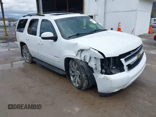 2013 Chevrolet Tahoe LT with VIN 1GNSKBE05DR293054, listed as a IAAI auction lot 41955877 with 192,474 mi miles and . Bid and sale history available at DreamBid. Image 6.