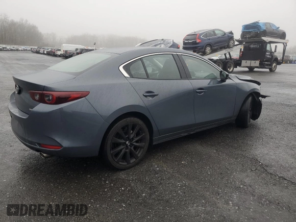 2023 Mazda 3 S Carbon Edition z VIN 3MZBPACM2PM377006, wystawiony jako Copart lot #85168304 z przebiegiem 20 920 mil mil oraz Szkoda całkowita • Salvage title. Historia ofert i sprzedaży dostępna na DreamBid. Obrazek 3.