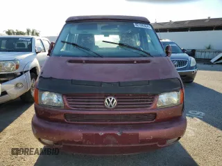 2003 Volkswagen EuroVan MV с VIN WV2NB47013H001081, выставлен на аукционе Copart как лот 82126354 с пробегом 158 433 миль миль и Чистый • Clean title. История ставок и продаж доступна на DreamBid. Изображение 5.