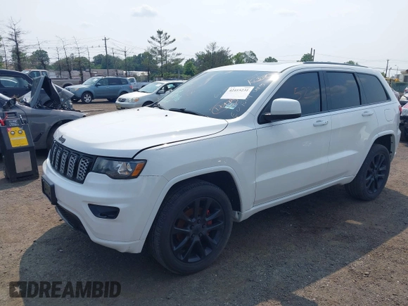 2020 Jeep Grand Cherokee Laredo E with VIN 1C4RJFAG5LC375033, listed as a IAAI auction lot 42415231 with 62,489 mi miles and . Bid and sale history available at DreamBid. Image 17.