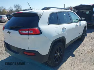 2014 Jeep Cherokee Latitude with VIN 1C4PJMCS9EW309289, listed as a IAAI auction lot 42003252 with 99,360 mi miles and . Bid and sale history available at DreamBid. Image 4.