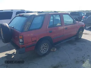 1994 Isuzu Rodeo LS z VIN 4S2CG58VXR4327327, wystawiony jako IAAI lot #41959576 z przebiegiem 169 794 mil mil oraz . Historia ofert i sprzedaży dostępna na DreamBid. Obrazek 4.