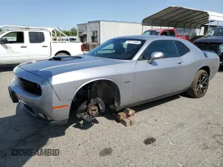 2016 Dodge Challenger R/T Plus with VIN 2C3CDZBT8GH101892, listed as a Copart auction lot 62171595 with 195,533 mi miles and Salvage title. Bid and sale history available at DreamBid. Image 1.