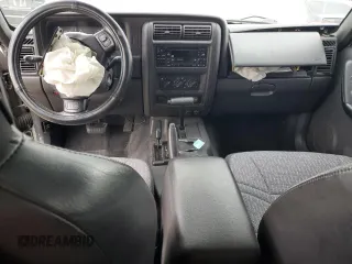 2001 Jeep Cherokee Sport with VIN 1J4FF48S91L592966, listed as a Copart auction lot 58996445 with 159,140 mi miles and Salvage title. Bid and sale history available at DreamBid. Image 8.