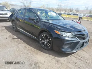 2018 Toyota Camry LE with VIN 4T1B11HK5JU076028, listed as a IAAI auction lot 41989266 with 215,235 mi miles. Bid and sale history available at carsss.com. Image 1.