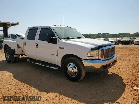 1999 Ford F-350 XL z VIN 1FTWW32F7XED47740, wystawiony jako Copart lot #69288404 z przebiegiem 201 638 mil mil oraz Szkoda całkowita • Salvage title. Historia ofert i sprzedaży dostępna na DreamBid. Obrazek 12.