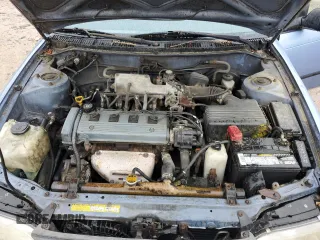 1995 Toyota Corolla DX with VIN 2T1AE09B5SC127586, listed as a Copart auction lot 57075045 with 244,969 mi miles and Salvage title. Bid and sale history available at DreamBid. Image 11.