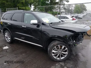 2023 Dodge Durango Citadel with VIN 1C4RDJEG1PC582304, listed as a IAAI auction lot 42528327 with 9,896 mi miles and . Bid and sale history available at DreamBid. Image 1.
