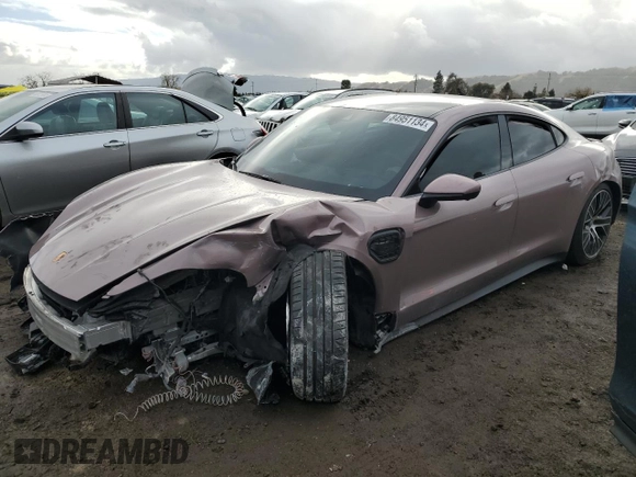 2022 Porsche Taycan with VIN WP0AA2Y11NSA14157, listed as a Copart auction lot 84951134 with 15,425 mi miles and Salvage title. Bid and sale history available at DreamBid. Image 1.