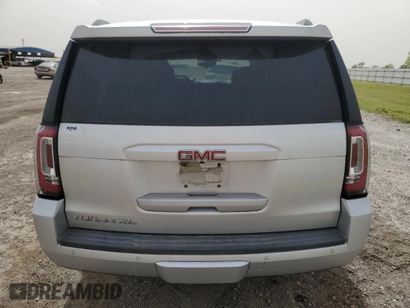 2019 GMC Yukon XL SLT with VIN 1GKS1GKC9KR288660, listed as a Copart auction lot 49669365 with 77,485 mi miles and Salvage Title. Bid and sale history available at carsss.com. Image 6.