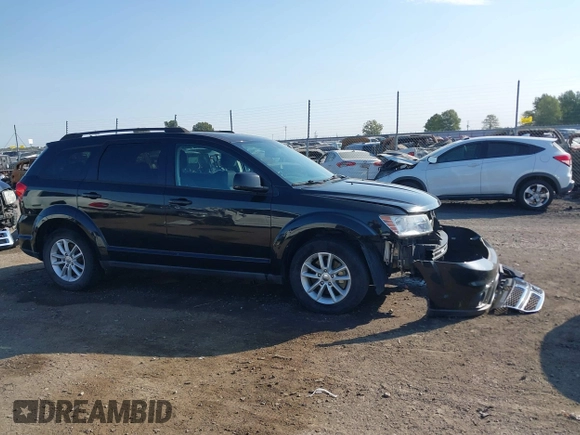 2013 Dodge Journey SXT with VIN 3C4PDCBG7DT710844, listed as a IAAI auction lot 40582910 with 136,741 mi miles and . Bid and sale history available at DreamBid. Image 13.