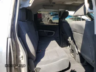 2015 Nissan Titan SL with VIN 1N6BA0EC5FN509230, listed as a Copart auction lot 73983574 with 144,288 mi miles and Salvage Title. Bid and sale history available at carsss.com. Image 10.