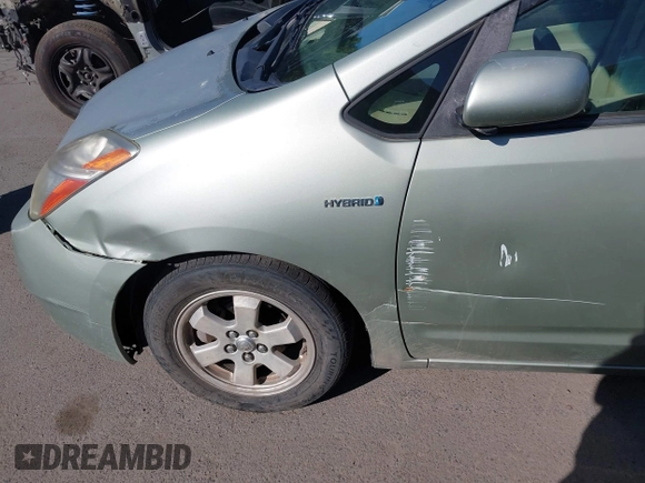 2007 Toyota Prius z VIN JTDKB20U973221624, wystawiony jako IAAI lot #42484947 z przebiegiem 257 311 mil mil oraz . Historia ofert i sprzedaży dostępna na DreamBid. Obrazek 12.