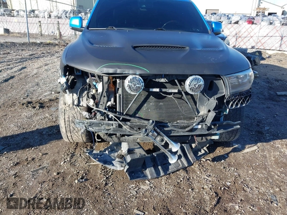 2018 Dodge Durango SRT z VIN 1C4SDJGJ1JC415720, wystawiony jako IAAI lot #41193674 z przebiegiem 63 140 mil mil oraz . Historia ofert i sprzedaży dostępna na DreamBid. Obrazek 6.