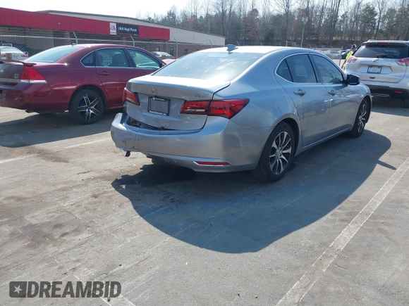 2015 Acura TLX with VIN 19UUB1F31FA017235, listed as a IAAI auction lot 41810472 with 130,762 mi miles. Bid and sale history available at carsss.com. Image 4.