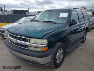 2003 Chevrolet Tahoe LS with VIN 1GNEC13V13J250718, listed as a IAAI auction lot 41981819 with 303,969 mi miles. Bid and sale history available at carsss.com. Image 2.