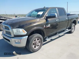 2013 Ram 2500 Laramie with VIN 3C6UR5FL7DG529590, listed as a IAAI auction lot 40608177 with 141,594 mi miles. Bid and sale history available at carsss.com. Image 2.