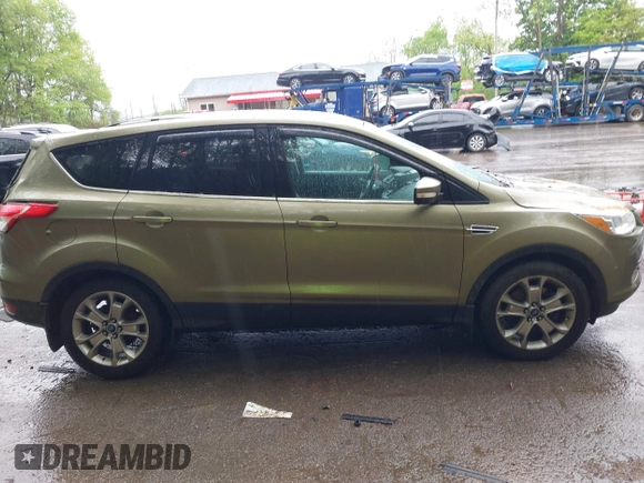 2013 Ford Escape SEL с VIN 1FMCU9HX2DUB52251, выставлен на аукционе IAAI как лот 42253659 с пробегом Не указан миль и . История ставок и продаж доступна на DreamBid. Изображение 13.