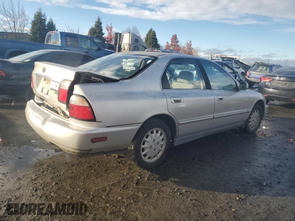 1996 Honda Accord EX with VIN 1HGCD5655TA161445, listed as a Copart auction lot 82195004 with 192,130 mi miles and Salvage Title. Bid and sale history available at DreamBid. Image 3.