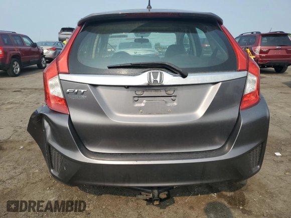 2015 Honda Fit EX-L z VIN 3HGGK5H83FM757658, wystawiony jako Copart lot #59907425 z przebiegiem 139 053 mil mil oraz Szkoda całkowita • Salvage title. Historia ofert i sprzedaży dostępna na DreamBid. Obrazek 6.