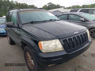 2000 Jeep Grand Cherokee Laredo with VIN 1J4G258S0YC182928, listed as a IAAI auction lot 42113376 with 259,882 mi miles and . Bid and sale history available at DreamBid. Image 1.