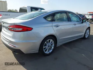 2019 Ford Fusion SE with VIN 3FA6P0HD4KR219338, listed as a IAAI auction lot 41856817 with 82,385 mi miles and . Bid and sale history available at carsss.com. Image 4.