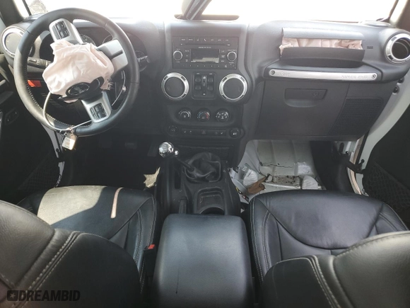 2017 Jeep Wrangler Unlimited Rubicon with VIN 1C4BJWFG7HL557799, listed as a Copart auction lot 77107544 with 172,022 mi miles and Salvage Title. Bid and sale history available at carsss.com. Image 8.
