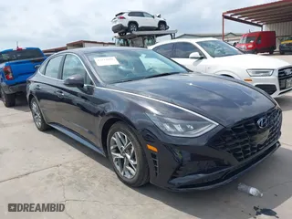 2023 Hyundai Sonata SEL with VIN KMHL64JA8PA270894, listed as a IAAI auction lot 42124828 with 51,411 mi miles. Bid and sale history available at carsss.com. Image 1.