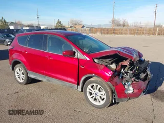 2017 Ford Escape SE z VIN 1FMCU0GD6HUE37298, wystawiony jako IAAI lot #41482468 z przebiegiem 95 502 mil mil oraz . Historia ofert i sprzedaży dostępna na DreamBid. Obrazek 1.