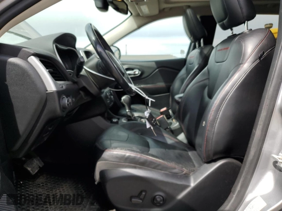 2014 Jeep Cherokee Trailhawk with VIN 1C4PJMBS6EW159174, listed as a Copart auction lot 56097795 with 130,299 mi miles and Salvage title. Bid and sale history available at DreamBid. Image 7.